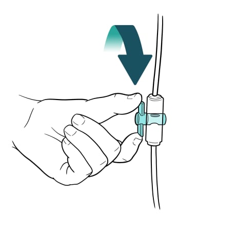 Clamp handle on bag tubing being twisted to the right.