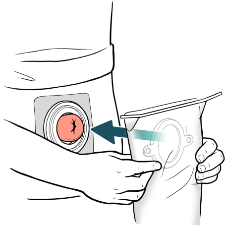 Person lining up circle opening of sleeve to fit on skin barrier around stoma.