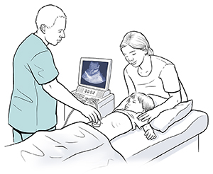 Niño acostado sobre una camilla. Un proveedor de atención médica sosteniendo un transductor de ultrasonido sobre la parte baja del abdomen del niño. Mujer parada cerca.